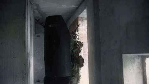 Armed and equipped group of special forces soldiers with a shield Stock Footage 327458906
