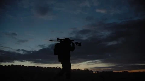 An armed and equipped special forces (SWAT) soldier with sniper rifle Stock Footage 327458908