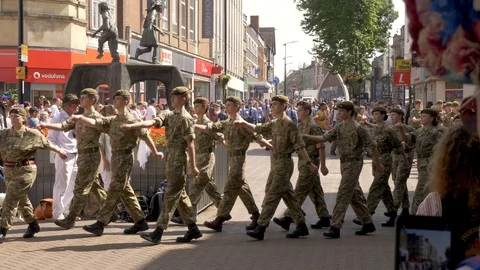 Armed Forces Day Parade of Troops marching on Abingron Street, Northampton on 29 Video stock 111526202