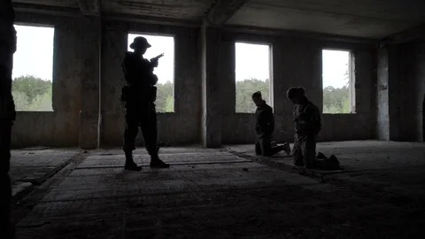 Armed guard and hostages Stock Footage 77017984