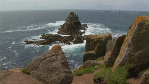 Armed Knight rock with rocky islets formations in Cornwall, England Stock Footage 101490729