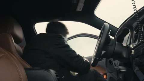 Armed Masked Criminal Exiting Car staged Filmscene, Berlin, Germany, Jan 28 2018 Stock-Footage 337179606