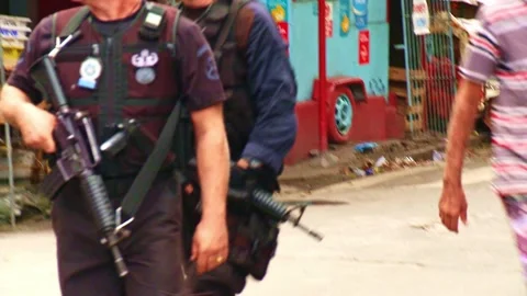 Armed Police In Black Uniforms Patrol Th 