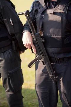 Armed policeman Stock Photos