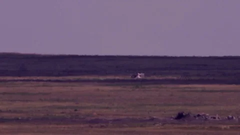 Armed projectiles with parachute hitting the target during russian military Stock Footage 73485157