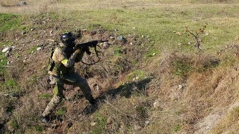 Armed soldier with automatic rifle Stock Footage 81671431
