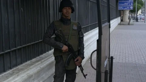 An Armed Soldier Smiling In Tahrir Square In Cairo, Egypt Stock Footage 158220618