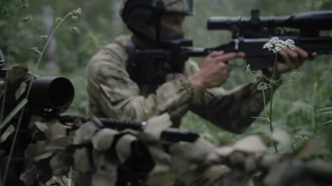 Armed soldiers snipers with rifles during a military operation Stock Footage 327354405