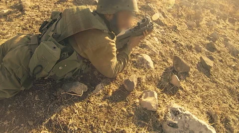 Armed soldiers walking through field. soldiers running with Machine gun weapons. Stock Footage 40134460
