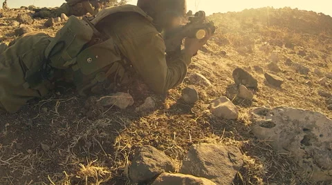 Armed soldiers walking through field. soldiers running with Machine gun weapons. Stock Footage 40136845