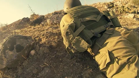Armed soldiers walking through field. soldiers running with Machine gun weapons. Stock Footage 40274010
