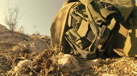 Armed soldiers walking through field. soldiers running with Machine gun weapons. Stock Footage 40301353