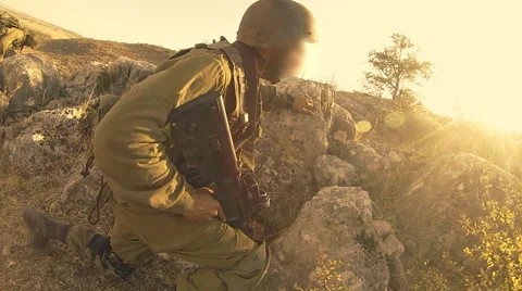 Armed soldiers walking through field. soldiers running with Machine gun weapons. Stock Footage 42746908