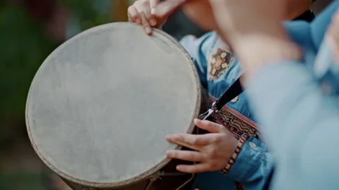 Armenian boy drummer's hands playing dhol drum in traditional armenian wear Stock Footage 165364812