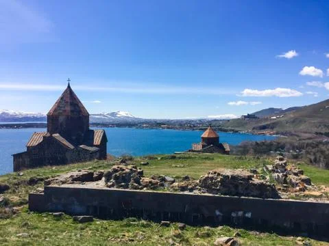 Armenian monastery of Sevanavank at lake Sevan in spring Stock Photos