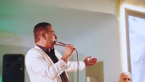 Armenian singer performs on stage, singe Stock Footage 207183223