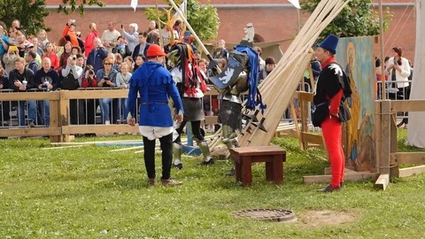 Armored knights preparing for jousting Stock Footage 77903557