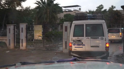 Armored Vehicles Pull into a Gated Area co Stock Footage 120931100