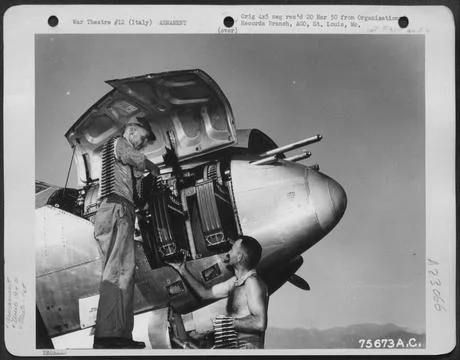 Armorers Load Ammunition In The Nose Of A Lockheed P-38 Lightning Of The 9... Stock Photos