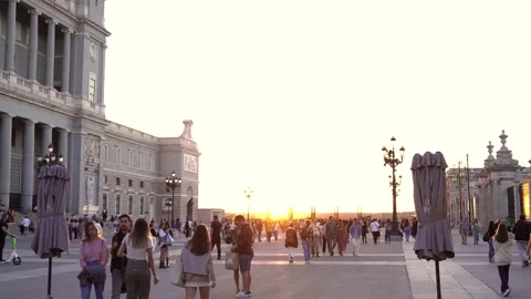 Armory square between Madrid Royal Palace and Almudena Cathedral at sunset Stock Footage 217411139