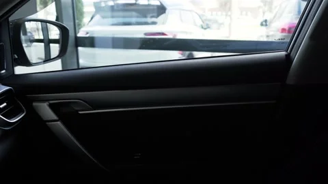 On the armrest the buttons for the electric elevating mechanism of windows in Video stock 156962913