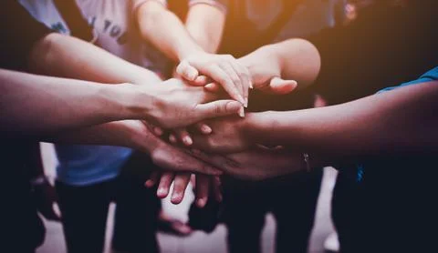 Arms together, teamwork. Collaboration 库存照片