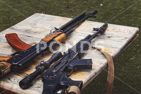 Arms trafficking. different rifles on the counter in the gun shop. clandestin Stock Photos