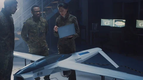 Army Aerospace Engineers Work On Unmanned Aerial Vehicle / Drone. Army Experts Stock Footage 106073045