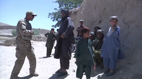 Army Afghanistan Soldiers Speak To Civilian Stock Footage