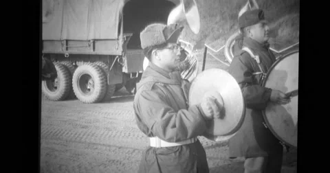Army band performing for Chinese Prisoners Stock Footage