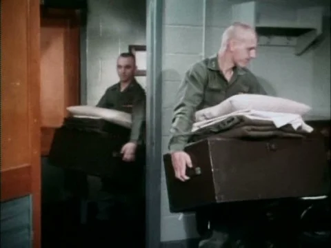 Army candidates for a leadership training program get installed in their dorms Stock Footage 75283748