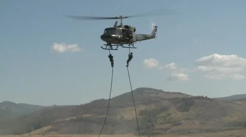 Army in combat, special forces, helicopter Stock Footage