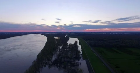 Army corps of engineers levee system at work during flood on Mississippi River Stock Footage 87189054
