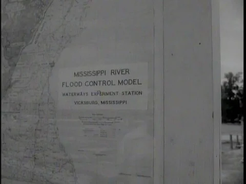 Army engineers observe a scale model of the Mississippi River Valley to test Stock Footage 75279891