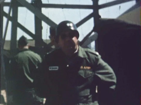 Army General On Base Talking On Radio and Writing On Clipboard - Vintage 8mm Stock Footage 78924889