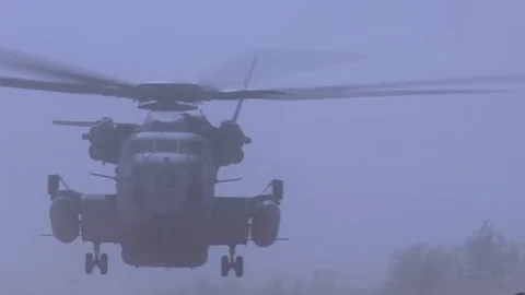 Army helicopter landing Stock Footage 84309822