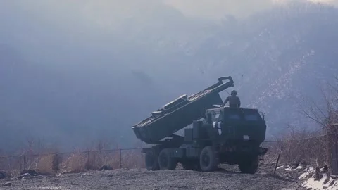 Army High Mobility Artillery Rocket System HIMARS rotating into launch position Stock Footage 274133979