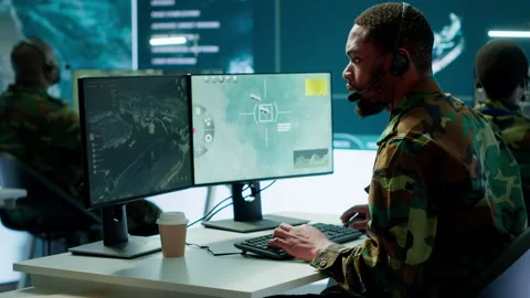 Army intelligence specialist utilize advanced computer systems Stock Footage 279951412