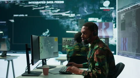Army intelligence specialist utilize advanced computer systems Stock Footage 280147349