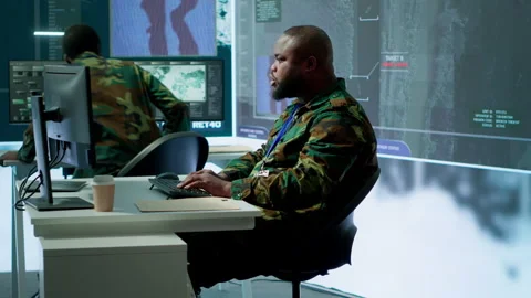 Army intelligence specialists using advanced computer systems and satellite data Stock Footage 279951217