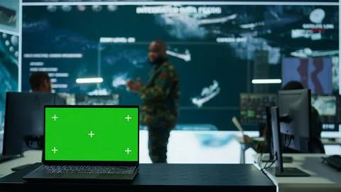 Army IT expert in control center collecting real time battlefield data Stock Photos