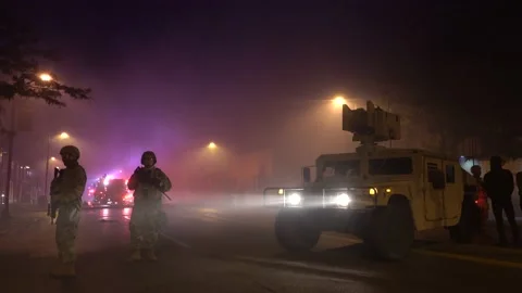 Army Protects Fire Fighters During Riots in Minneapolis Stock Footage