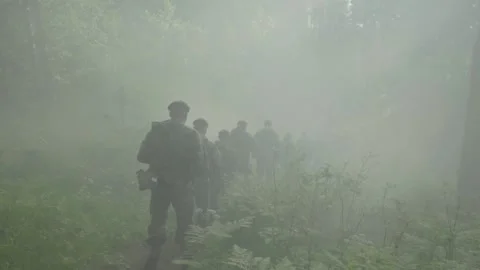 Army recruits doing basic training for a platoon attacking a battlefield with a Stock Footage 206684122
