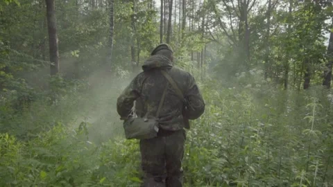 Army recruits doing basic training for a platoon attacking a battlefield with a Video stock 206684296