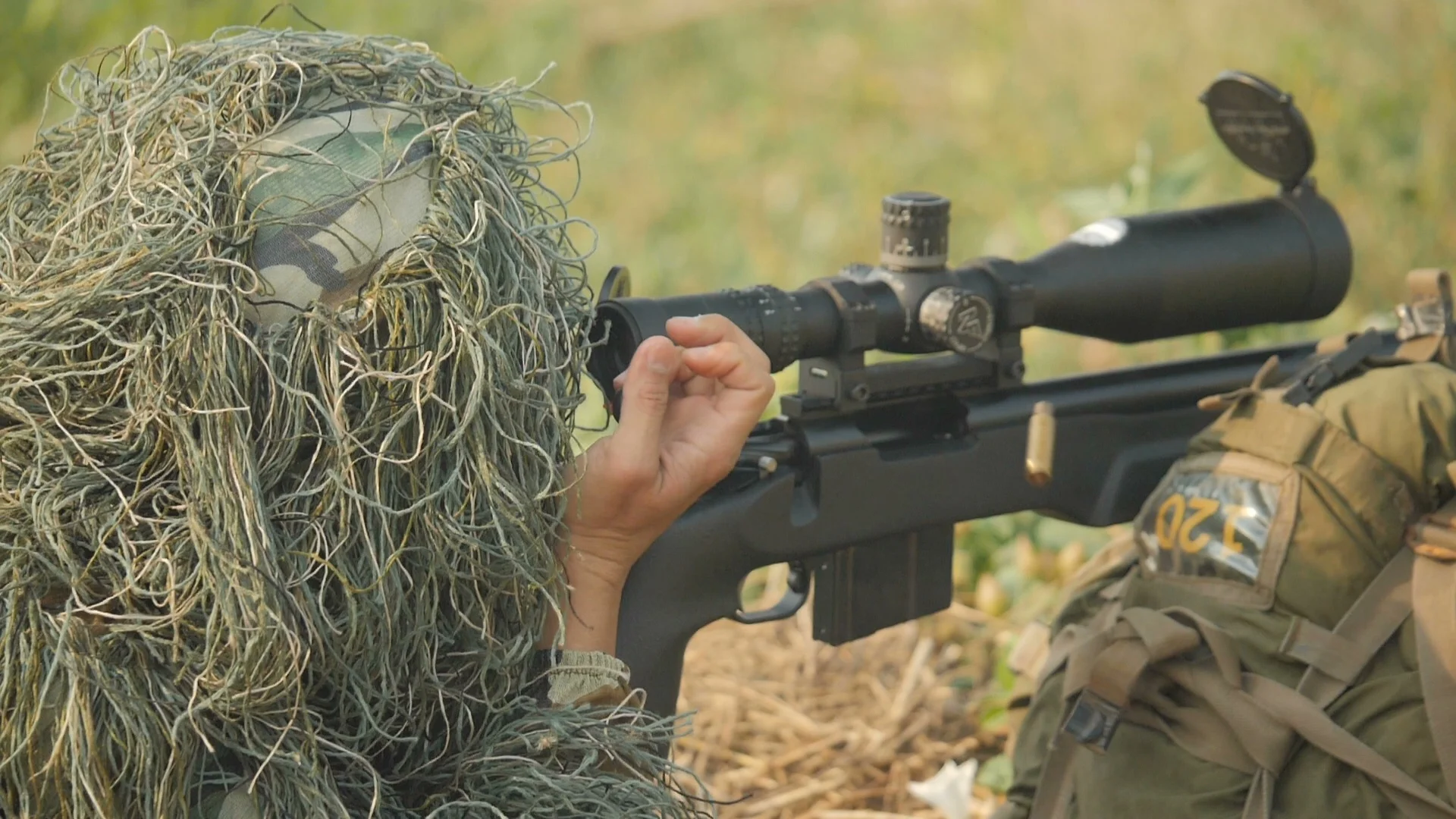 Sniper reload his rifle in forest Stock Photo by ©Nesterenko_Max 89103288