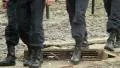 Army soldiers in conflict situation - shoes walking over HD Footage