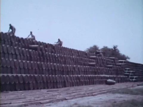 Army vehicles are stored in open spaces while perishable products are stored in Vídeos de archivo 75303049