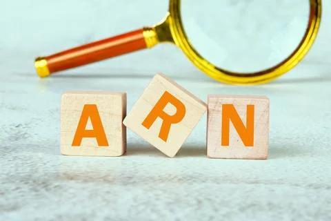 ARN as Account Reference Number word is assembled from wooden cubes with a ma Stock Photos
