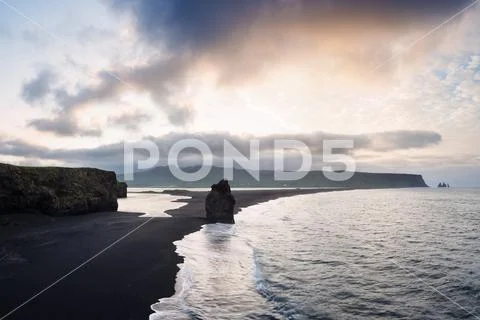 Arnardrangur stack - a tourist attraction in Iceland Stock Photos