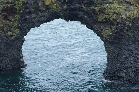 Arnarstapi basalt rock arch formation, Iceland Stock Photos